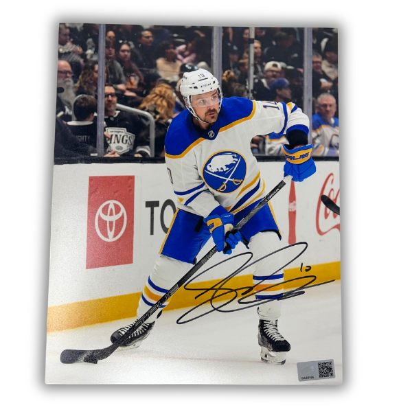 Sam Carrick Signed Handling Puck in Away Jersey Photo