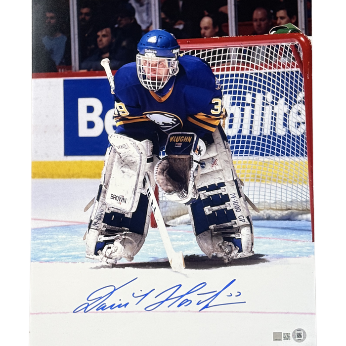 Dominik Hasek Signed in Net Wearing Blue Uniform 16x20 Photo