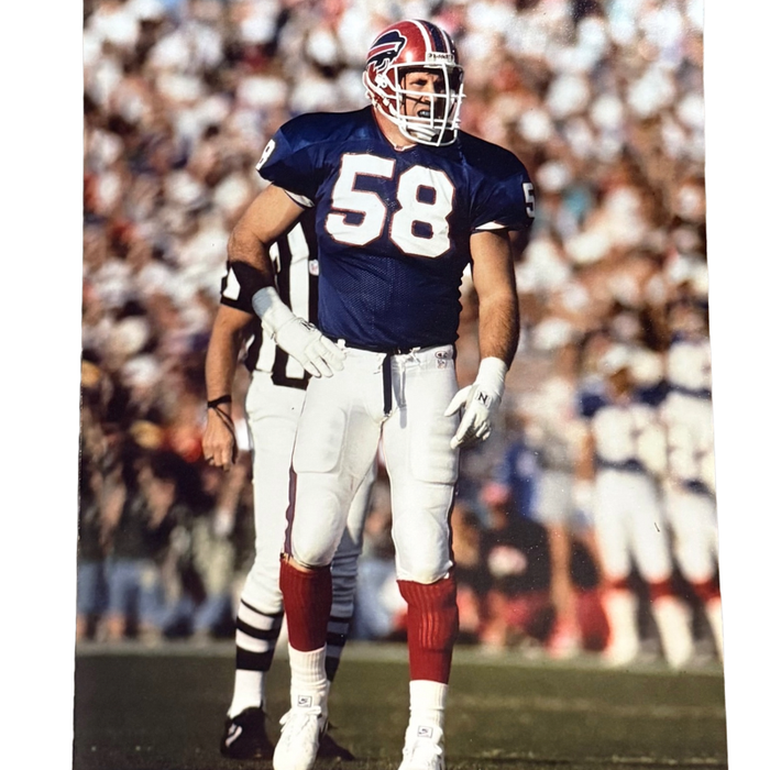 Shane Conlan Unsigned Standing in Blue 8x10 Photo