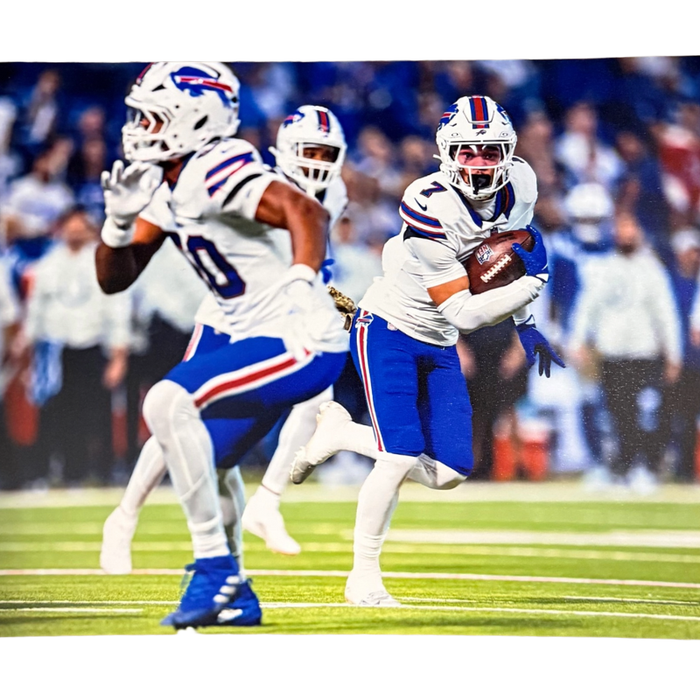 Taron Johnson Unsigned Running with Ball 8x10 Photo