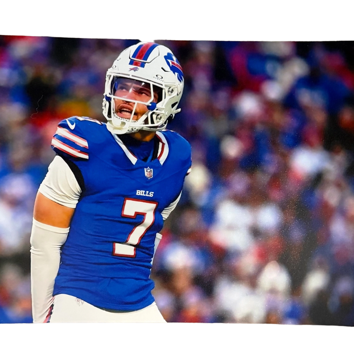 Taron Johnson Unsigned Looking Up in Blue 8x10 Photo