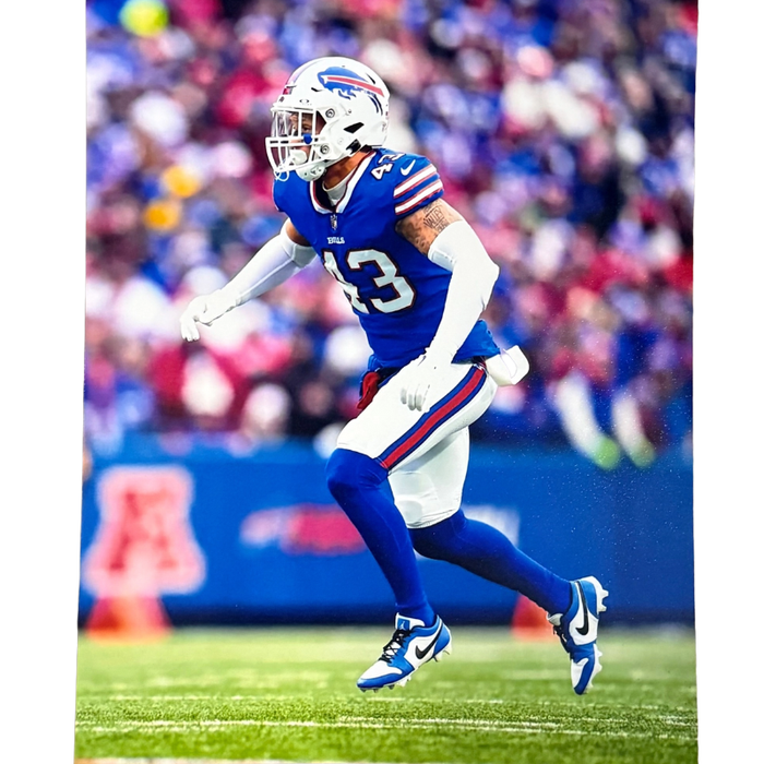 Terrel Bernard Unsigned Running in Blue 8x10 Photo