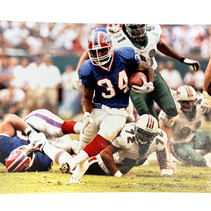 Thurman Thomas Unsigned Running with Ball vs. Dolphins 8x10 Photo