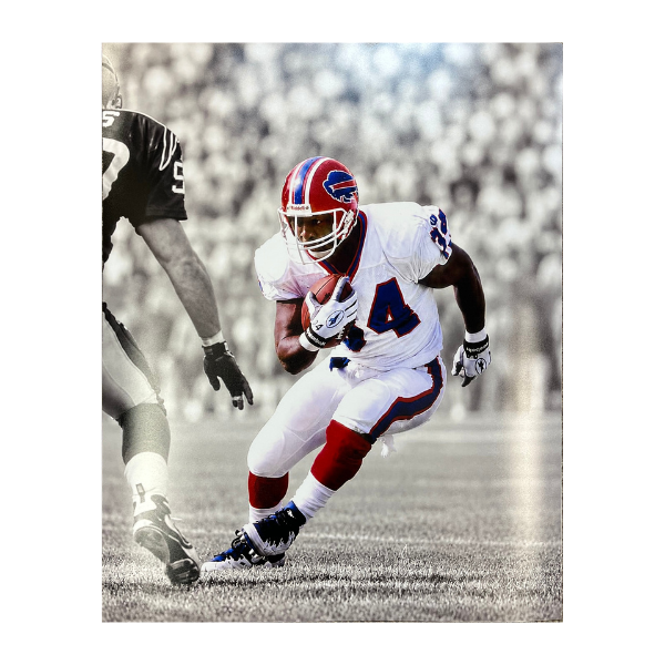 Thurman Thomas Unsigned Running in White Spotlight Photo